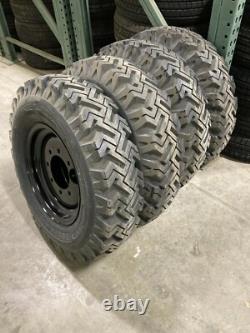 4 skid-steer snow tires replace 10x16.5 & 12x16.5 bolt on ready! Black 12 ply