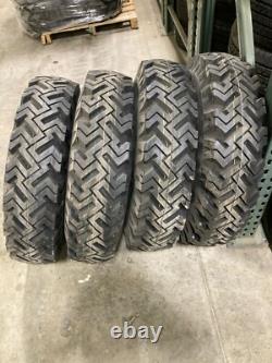 4 skid-steer snow tires replace 10x16.5 & 12x16.5 bolt on ready! Black 12 ply